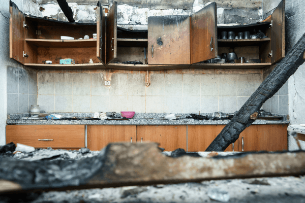 kitchen after house fire in need of Fire Damage Restoration