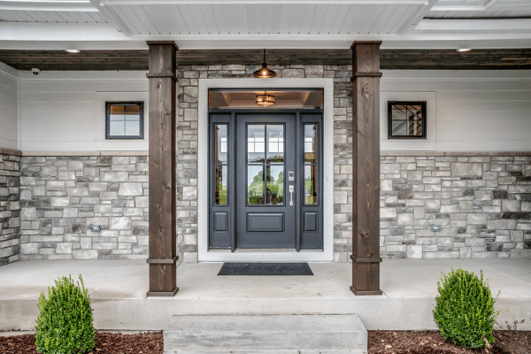 home exterior remodel example- beautiful front door set in stone facade